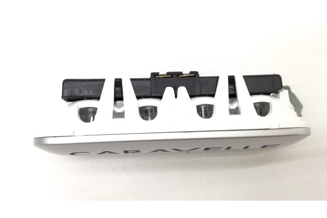 7E5947415F72A VAG Lampka z napisem Caravelle stopnia wejściowego srebrna LED  VW T5 TRANSPORTER 7E