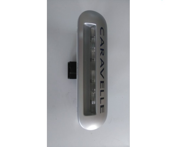 7E5947415F72A VAG Lampka z napisem Caravelle stopnia wejściowego srebrna LED  VW T5 TRANSPORTER 7E